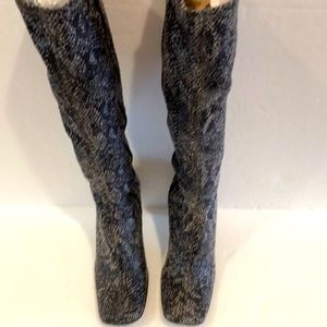 Knee High Boots with a beautiful Snake print! They are new, never worn. Size 6.5